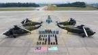 Sikorsky Nuri S-61 pilots and crew with the aircraft in RMAF livery