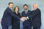 (Left to Right) Domingo Castro, Indra Defense Systems Director, Lockheed Martin VP, Michele Evans, Manuel Escalante, Indra Defense and Security and Vice President and Lockheed Martin VP Brad Hicks shake hands after signing the Heads of Agreement.
