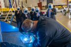 A welder authenticates the keel of Littoral Combat Ship (LCS) 31, the future USS Cleveland, by welding the initials of the ship’s sponsor, Robyn Modly, wife of a Clevelander and former U.S. Navy Secretary, who has embraced the city as her own.