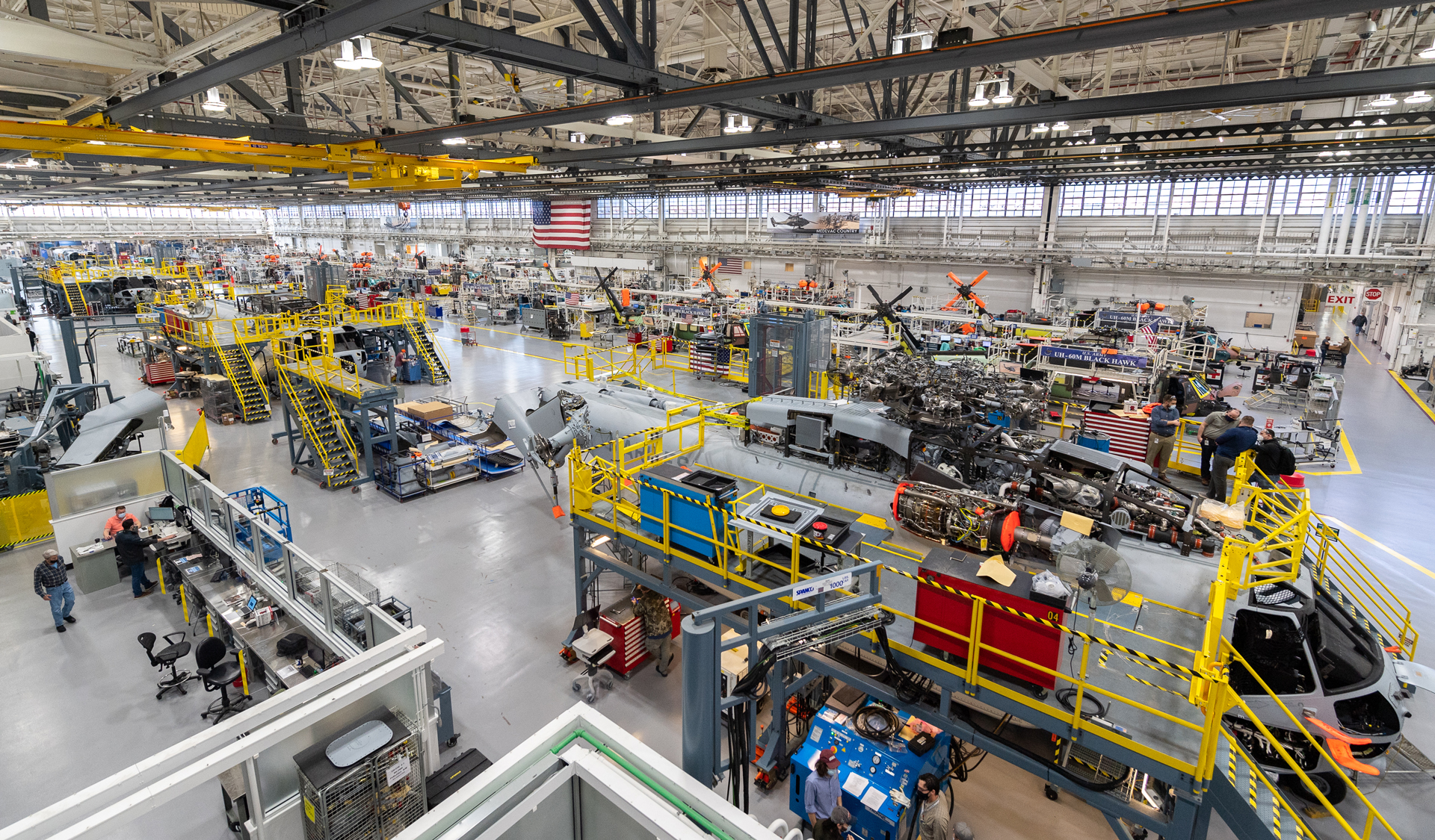 Stratford, Conn.: Sikorsky employees building CH-53K ™aircraft utilizing 3-D work instructions, new titanium machining centers with multi-floor ergonomic platforms.
