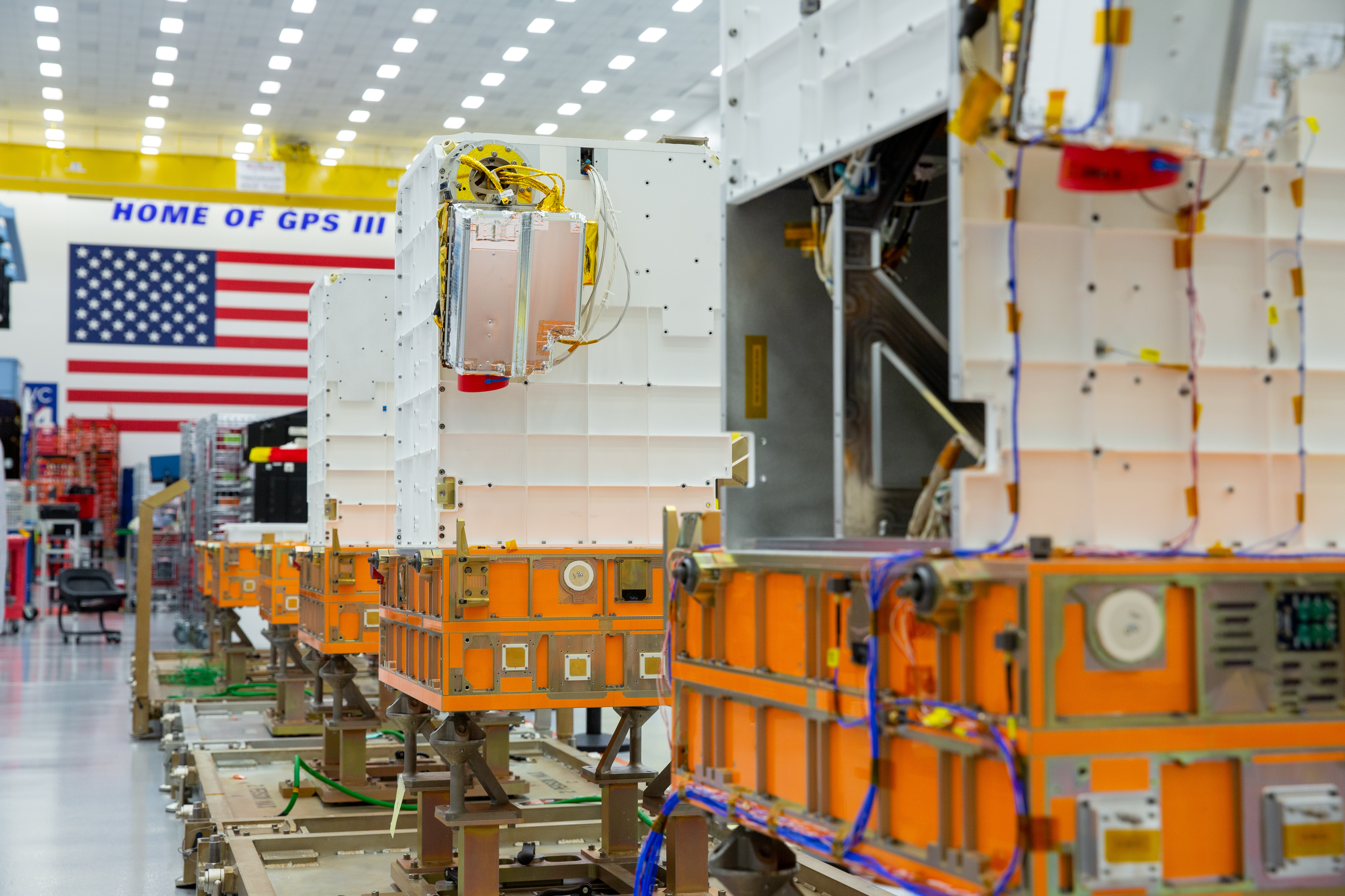 Lockheed Martin’s Tranche 0 Transport Layer satellites are seen in one of its processing facilities